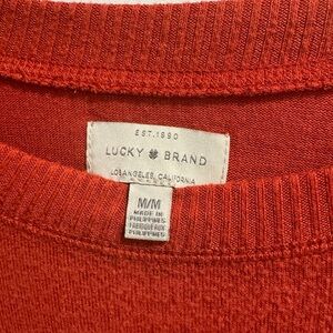 Women’s Lucky Brand pullover cute orange top size M